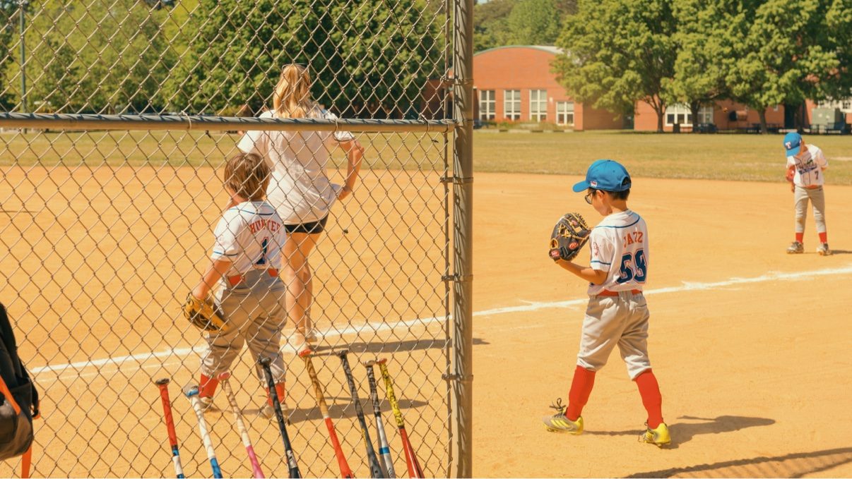 Through the fence, glove up